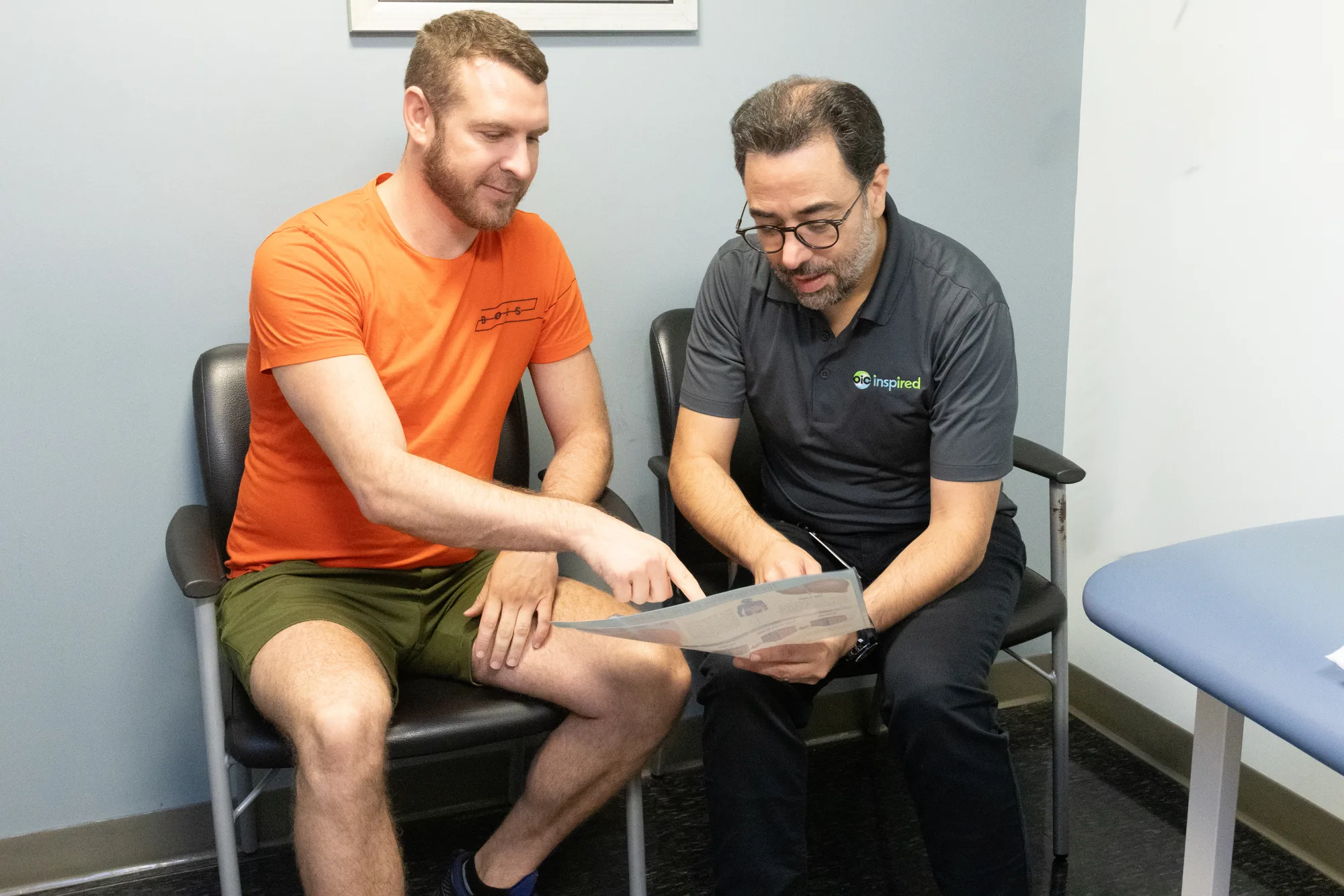OIC Inspired provider reviewing information with a patient